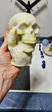 Load image into Gallery viewer, Serpentine Skull in Claw

