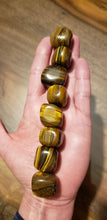 Load image into Gallery viewer, Tiger Eye Tumble Stones
